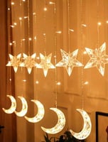 إضاءة ستارة بأشكال نجوم وهلال باضاءة صفراء