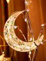 إضاءة ستارة بأشكال نجوم وهلال باضاءة صفراء