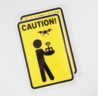 ملصق تحذير طيار درون