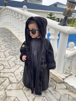 فروه اطفال سوداء