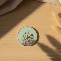 تعليقة سيارة وجهين