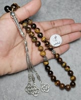 مسباح حجر عين النمر سبحة تايقر فخمه 38 خرزه