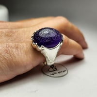 خاتم فضه اسطوري بحجر جمشت اماتيست طبيعي منقوش : إن...