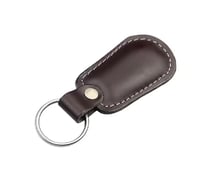 مجموعة مكونة من حقيبة يد صغيرة وساعة وسلسلة مفاتيح...