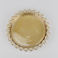 كوستر زجاجي ذهبي