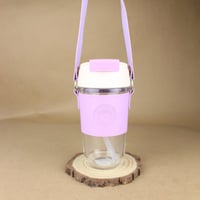 كوب زجاجي للمشروبات الباردة بمسكة وتعليقة جلد 380...