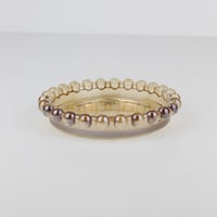 كوستر زجاجي ذهبي