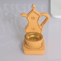 مجموعه (12) مباخر دلة بي علبة شفاف لون سكري