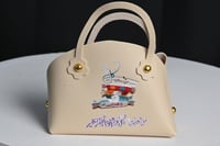 مجموعه(12) شنطة جلد مع عبارة من العايدين كل عام وا...