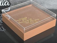 تبسي ملبس جلد مع غطاء اكريلك بي عبارة كل عام وانتم...