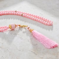 مجموعة (12) سبحة للتوزيعات وردي