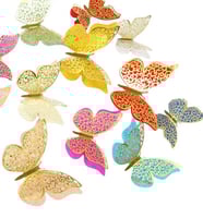 مجموعة (12) ملصق شكل فراشة ملونه بتصميم قص مجوف