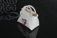 مجموعه (12) شنطة حلد لتوزيعات العيد