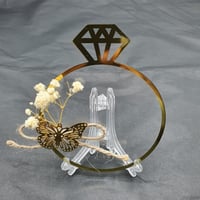 مجموعة (12) قاعده اكريلك شفاف بتزيين بدون الاستاند