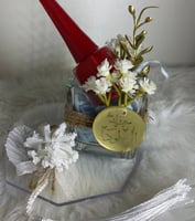 مجموعة (12) فازة زجاج مربع وتولة عطر ومناكير ولوجو...