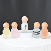 مجموعه(12) عطورات بغطاء خشبي بدون طباعه