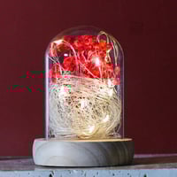 فازرة مضية بقاعدة خشبية