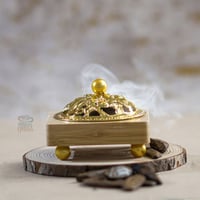 مجموعة (12) مبخرة خشبية بقاعدة ذهبية