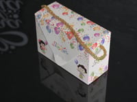 مجموعة (12) حقيبة توزيعات ورقية فاخرة بلون ابيض وع...