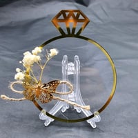 مجموعة (12) قاعده اكريلك شفاف بتزيين بدون الاستاند