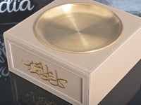 تبسي ملبس جلد بيج مع صحن استيل 30*30ارتفاع12 مع اخ...
