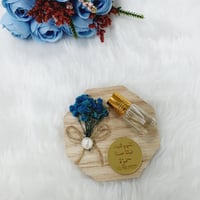 مجموعة (12) تولة عطر مسك بقاعدة ورد مع التنسيق ولو...