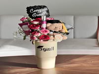 كوب تخرج مع ورد