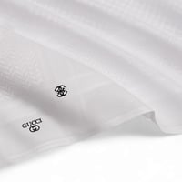 شماغ جوتشي ابيض