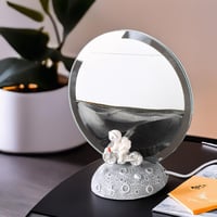 مصباح زجاجي من الرمال المتحركة مع إضاءة دائرية