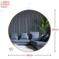 مراية دائرية كبيرة تعلق على الحائط بإطار ذهبي