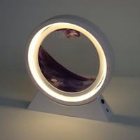 إضاءة ليد مع لوحة زجاج بتصميم الرمال المتحركة