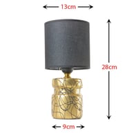 اباجورة إضاءة بقاعدة ذهبي اسود