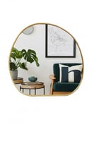 ديكور المرآة المموجة بإطار ذهبي