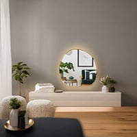 ديكور المرآة المموجة بإطار ذهبي