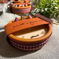 شمعة ورود مع تاق بعبارة