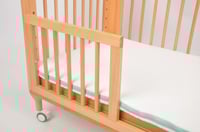 مرتبة السرير الخشبي