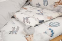 مفرش السرير الخشبي