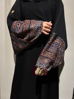 عباية كم لف مشجر