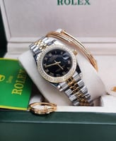 طقم ساعة رولكس نسائي مع خاتم وسوارة بالاضافة الى م...