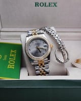 طقم ساعة رولكس نسائي مع خاتم وسوارة بالاضافة الى م...