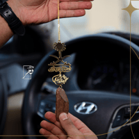 تعليقة شكل سيفين ونخلة