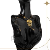 عقد الأسم في دائرة ميني ماوس