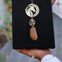 تعليقة شكل هلال وخيل