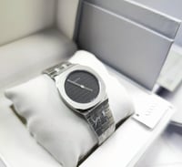 ساعه قوتشي نسائي