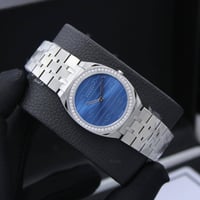 ساعه قوتشي ذهبي بكرستال