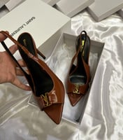 كعب سان لوران لمعه