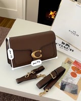 شنطه كوتش بني محروق لوقو ذهبي