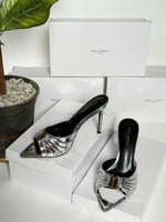 كعب سان لوران ذهبي فضي