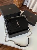 شنطه سان لوران مطفي