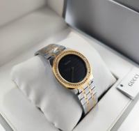 ساعه قوتشي نسائي